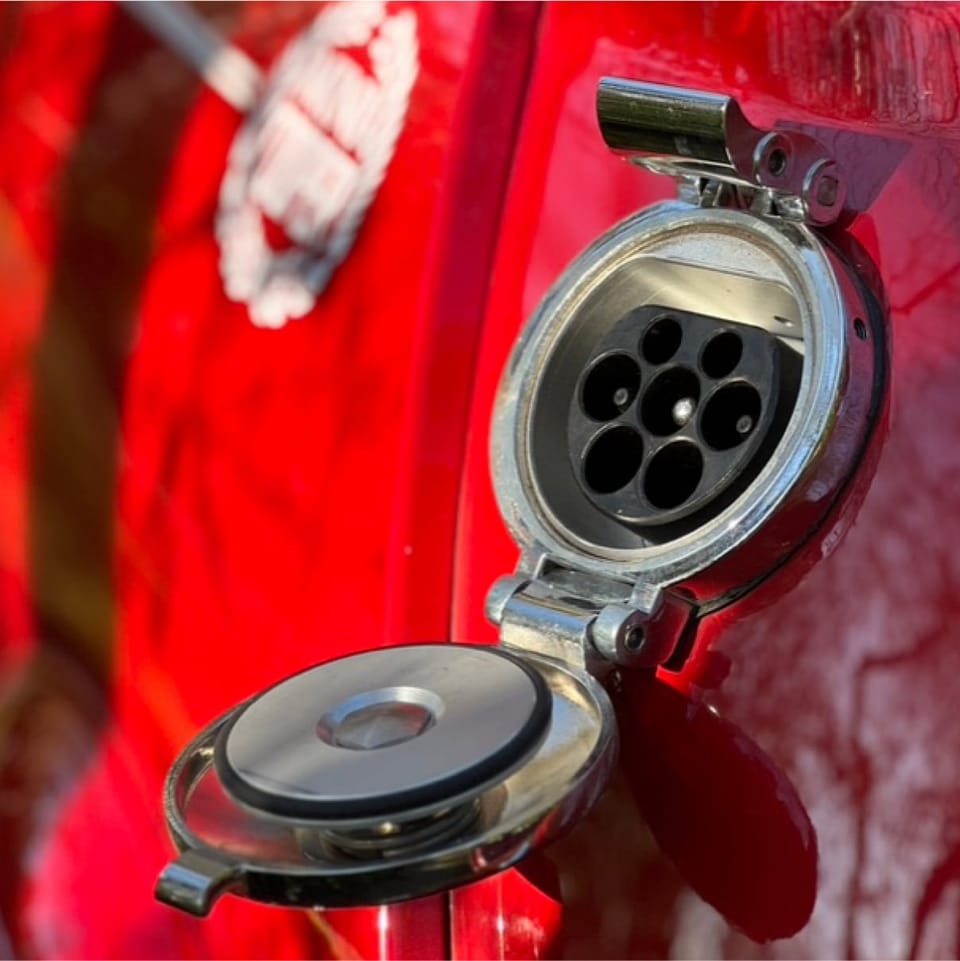 The original fuel filler and cap detail on the Mini.